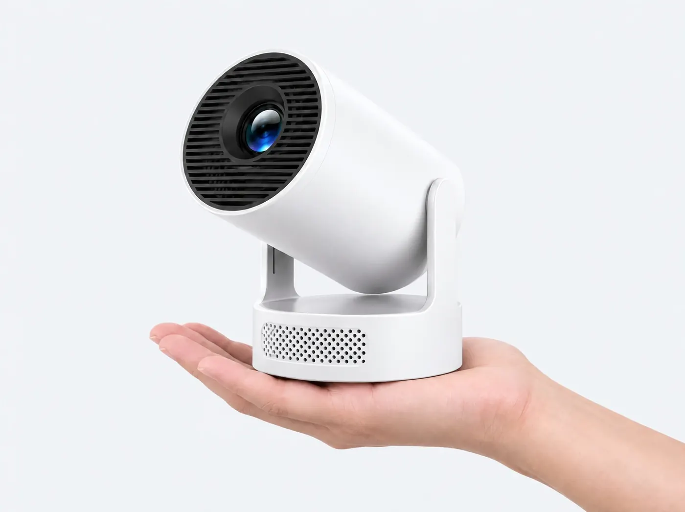Le vidéoprojecteur tenu dans la paume d’une main